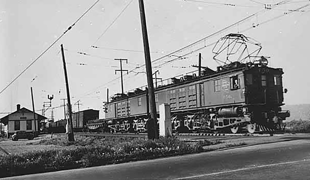 Milwaukee Railroad freight train arriving at Auburn depot 1948